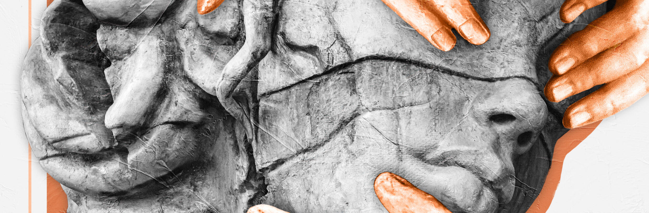 a cropped image of an image featuring the head of a stone statue, which is in grayscale, and the fingertips of stone hands colored orange.